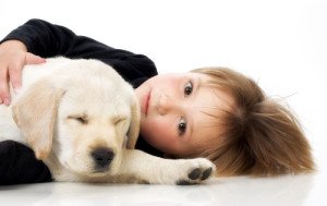 child with pet